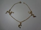 Cód. P4150g - Pulseira folheada a ouro 18k - Golfinho