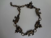 Cód. P1316f - Pulseira elefante folheada c/ ouro envelhecido